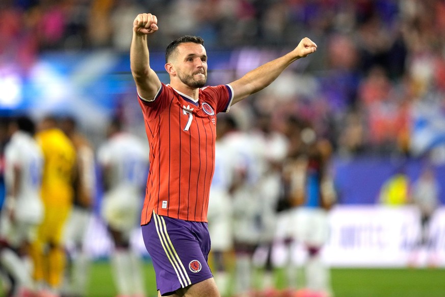 Scotland's John McGinn (7) celebrates a win following the World Cup Group C soccer match between Haiti and Scotland in Foxborough, Mass., near Boston, Saturday, June 13, 2026. (AP Photo/Charlie K ...