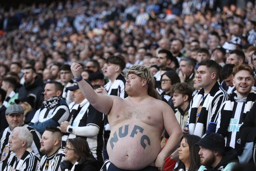 Newcastle fans attend the start of the English League Cup final soccer match between Manchester United and Newcastle United at Wembley Stadium in London, Sunday, Feb. 26, 2023. (AP Photo/Scott Heppell ...