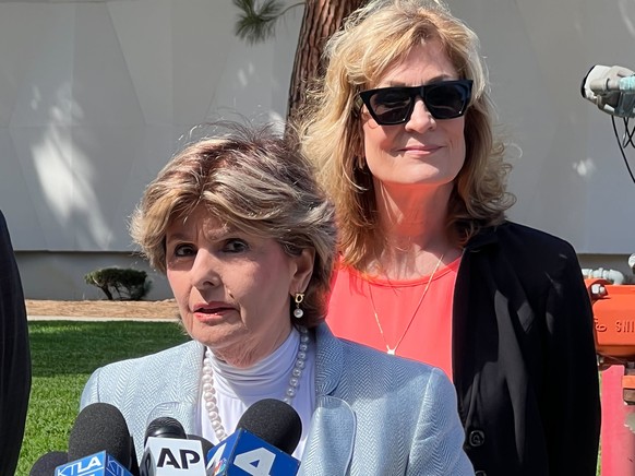 Attorney Gloria Allred speaks as Judy Huth looks on following a verdict in Huth&#039;s favor in a civil trial involving actor Bill Cosby outside the Santa Monica Courthouse on Tuesday, March 21, 2022. ...