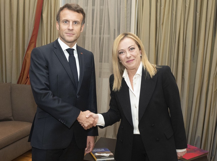 epa10261654 A handout photo made available by Chigi palace shows Italian Premier Giorgia Meloni meets French President Emmanuel Macron, Rome, Italy, 23 October 2022. EPA/FILIPPO ATTILI / CHIGI PALACE  ...