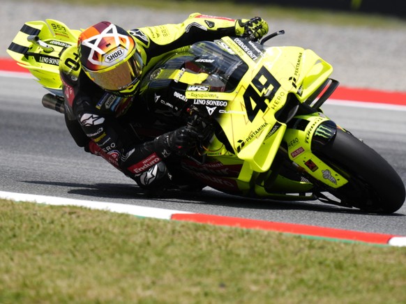 Fabio Di Giannantonio a su tirer son 駱ingle du jeu dans un Grand Prix compl鑼ement fou.