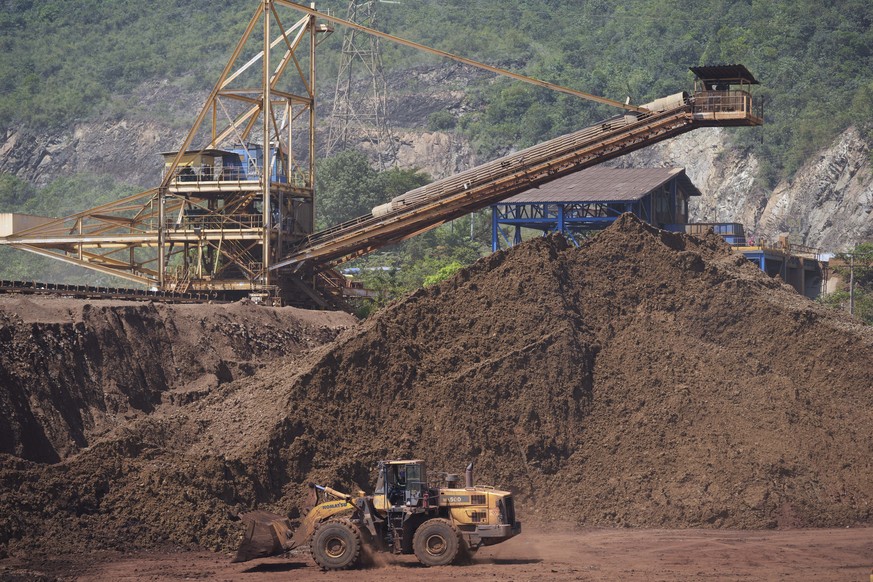 Equipment sits idle in the nickel mine run by the Swiss-based Solway Investment Group stands next to Izabal Lake in El Estor in the northern coastal province of Izabal, Guatemala, Tuesday, Oct. 26, 20 ...