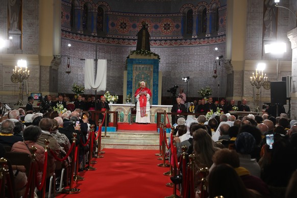 epa12887751 Pope Leo XIV during his meeting with the Algerian community in the Basilica of Our Lady of Africa in Algiers, Algeria, 13 April 2026. The Pope has embarked on an eleven-day apostolic journ ...