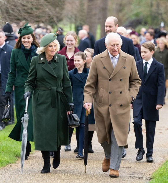 SANDRINGHAM, NORFOLK - DECEMBER 25: Catherine, Princess of Wales, Queen Camilla, Princess Charlotte of Wales, King Charles III, Prince William, Prince of Wales and Prince George of Wales attend the Ch ...