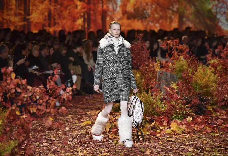 A model wears a creation for Moncler Gamme Rouge Fall-Winter 2017/2018 ready-to-wear fashion collection presented Tuesday, March 7, 2017 in Paris. (AP Photo/Zacharie Scheurer)