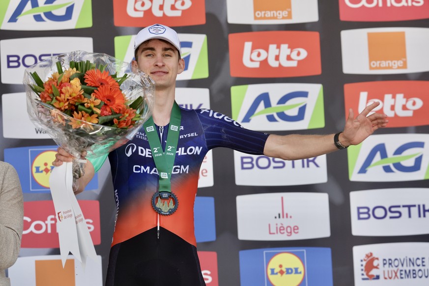 epa12915254 Second placed French rider Paul Seixas of team Decathlon CMA CGM Team poses on the podium after the Liege Bastogne Liege one-day cycling race over 259.5km from Liege to Liege, Belgium, 26  ...