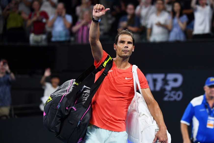 epa11058916 Rafael Nadal of Spain cheers to the crowd as he leaves the court after losing his quarter-final match against Jordan Thompson of Australia at the 2024 Brisbane International tennis tournam ...