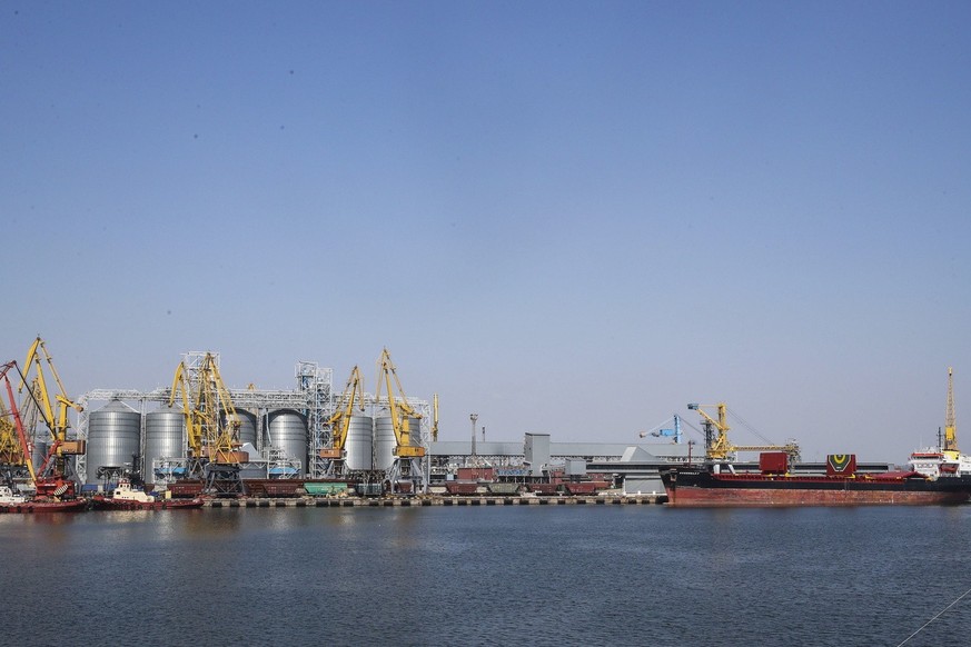 A general view over a part of the port with grain silos and Comoros-flagged cargo vessel Kubrosli Y mooring while UN Secretary-General Guterres (not pictured) visits to the Odesa grain port, in Odesa, ...