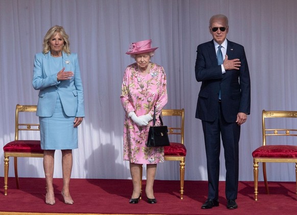 WINDSOR, ENGLAND - JUNE 13: Queen Elizabeth II with U.S. President Joe Biden and First Lady Jill Biden at Windsor Castle on June 13, 2021 in Windsor, England. Queen Elizabeth II hosts US President, Jo ...