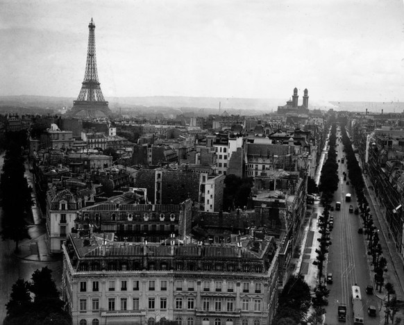 27th July 1931: A view of the Eiffel Tower, Paris from the top of the Arc de Triomphe. (Photo by Francis M. R. Hudson/Topical Press Agency/Getty Images)