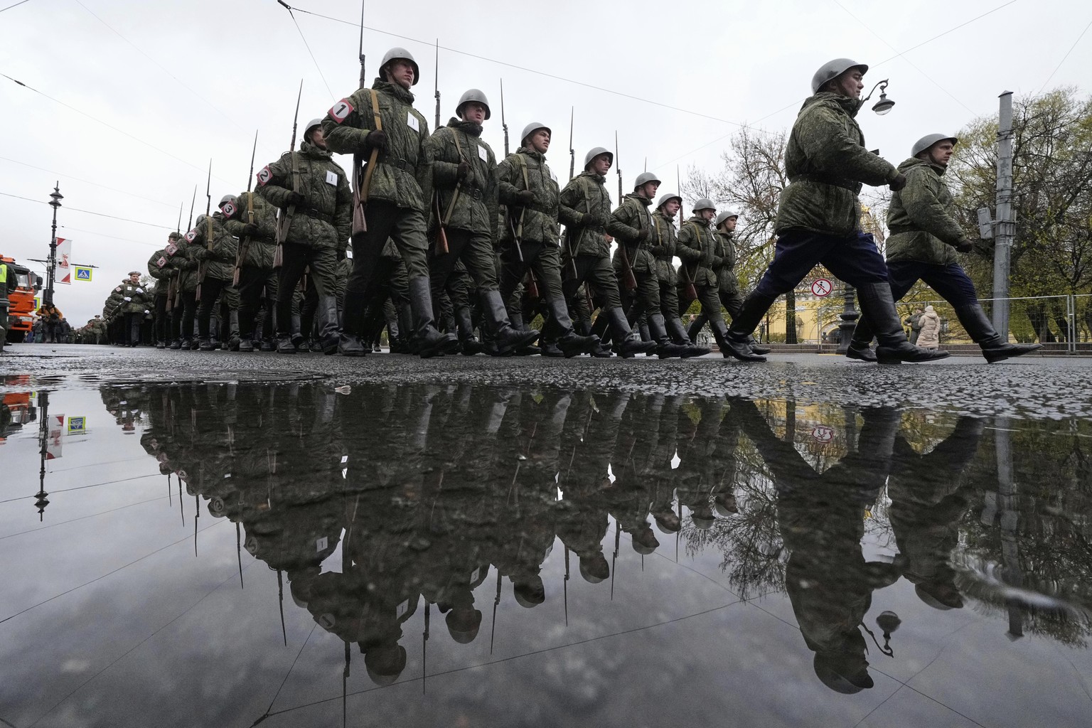 Russian army soldiers march to attend a dress rehearsal for the Victory Day military parade at the Dvortsovaya (Palace) Square in St. Petersburg, Russia, Wednesday, May 7, 2025. (AP Photo/Dmitri Lovet ...