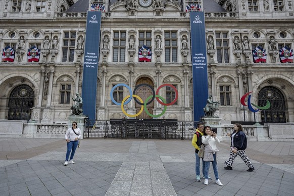 The Olympic rings are seen in front of the Paris City Hall, in Paris, Sunday, April 30, 2023. The 2024 Olympic Games will take place from July 26 to Aug.11, 2024 in Paris an other venues. (AP Photo/Au ...