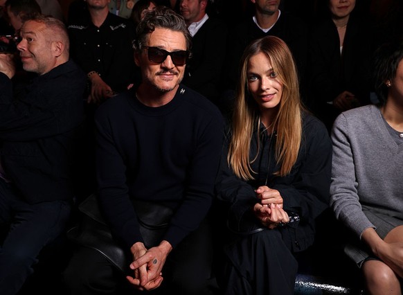 PARIS, FRANCE - OCTOBER 06: (EDITORIAL USE ONLY - For Non-Editorial use please seek approval from Fashion House) Pedro Pascal and Margot Robbie attend the Chanel Womenswear Spring/Summer 2026 show as  ...