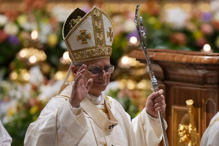 Pope Leo XIV waves after leading the Easter Vigil inside St. Peter's Basilica at The Vatican, Saturday, April 4, 2026. (AP Photo/Andrew Medichini)
Pope Leo XIV