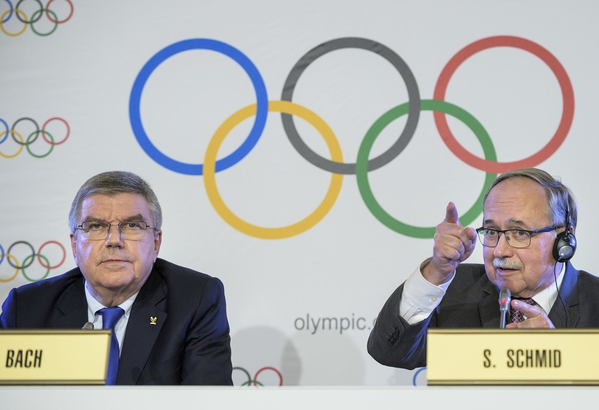 L'ancien conseiller fédéral, Samuel Schmid (à droite), a dirigé l'enquête du CIO sur le système de dopage d'Etat en Russie aux JO de Sotchi en 2014.
