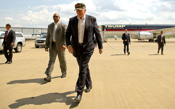 MOON TOWNSHIP, PA - JUNE 11: Republican candidate for President Donald Trump arrives in his plane to speak to supporters at a rally at Atlantic Aviation on June 11, 2016 in Moon Township, Pennsylvania ...