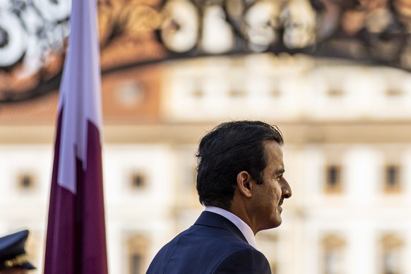 epa10224272 Qatar&#039;s Emir Sheikh Tamim bin Hamad Al-Thani attends welcoming ceremony prior to talks with Czech President Milos Zeman at Prague Castle in Prague, Czech Republic, 05 October 2022. EP ...