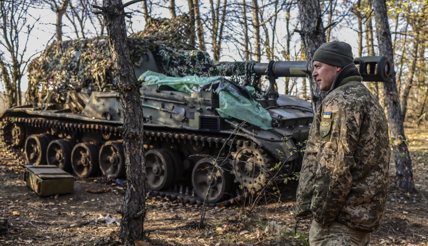 epa10273473 Ukrainian soldiers take a break in northern Kherson region, Ukraine, 29 October 2022. Russian troops on 24 February entered Ukrainian territory, starting a conflict that has provoked destr ...
