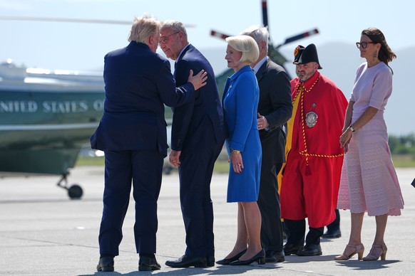 President Donald Trump is welcomed by H.E. Guy Parmelin, President of the Swiss Confederation, Ambassador Callista Gingrich U.S. Ambassador to Switzerland, Speaker Newt Gingrich, former Speaker of the ...