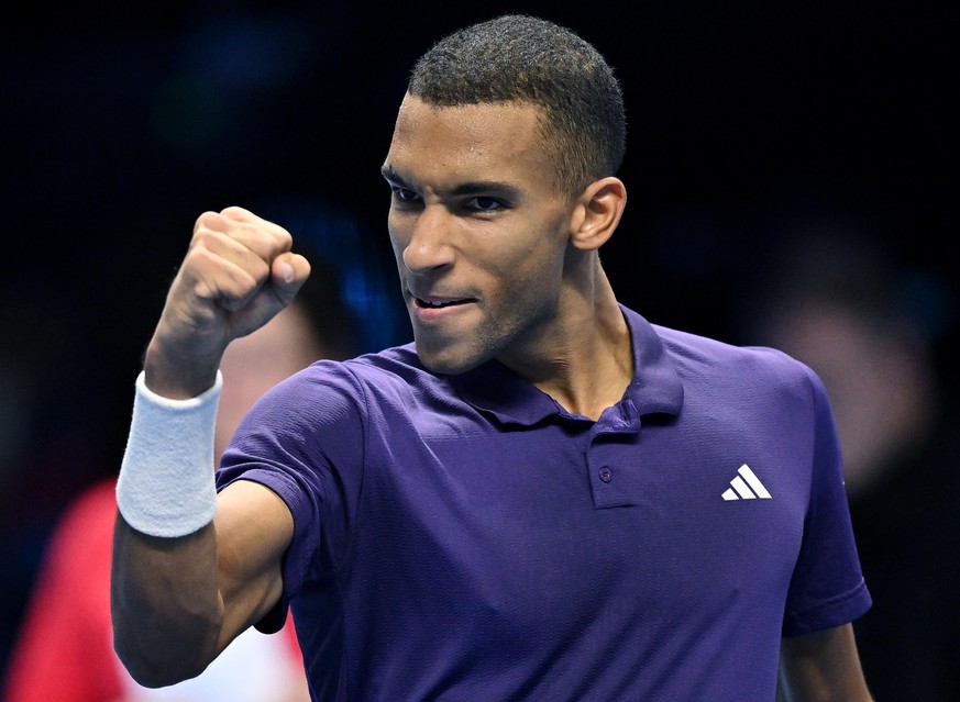 epa12520860 Felix Auger-Aliassime of Canada celebrates after winning the singles Round Robin match against Ben Shelton of USA at the ATP Finals in Turin, Italy, 12 November 2025. EPA/ALESSANDRO DI MAR ...