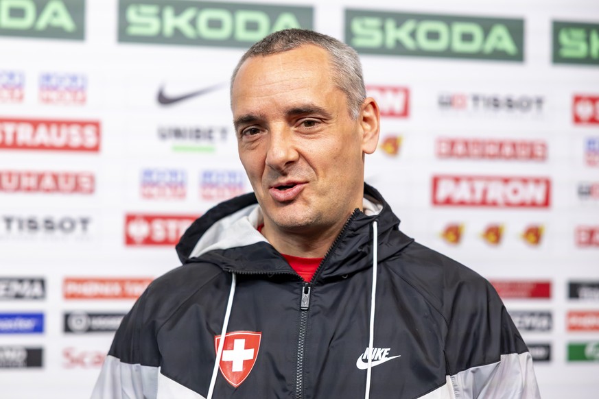 Jan Cadieux Jan, assistant coach of Switzerland national ice hockey team, speaks with media in the mixed zone of the Jyske Bank Boxen after a Switzerland team training session, at the IIHF 2025 World  ...