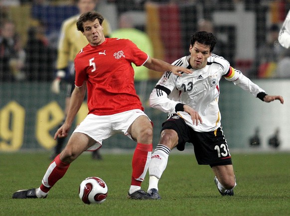 Germany's Michael Ballack, right, fights for the ball against Xavier Margairaz from Switzerland during the friendly soccer match between Germany and Switzerland at the LTU Arena in Duesseldorf, German ...