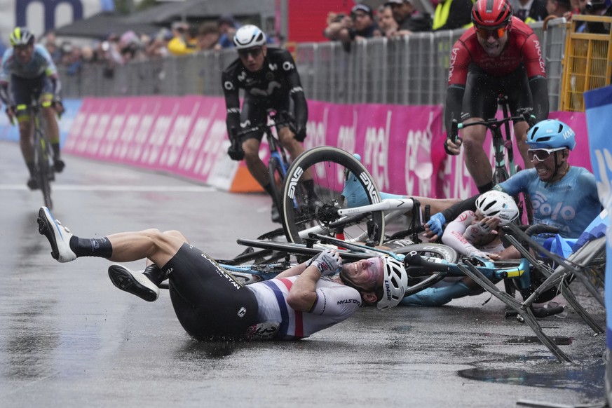 FILE - Britain&#039;s Mark Cavendish, front, crashes close to the finish line for the fifth stage of the Giro d&#039;Italia cycling race from from Atripalda to Salerno, Italy, Wednesday, May 10, 2023. ...