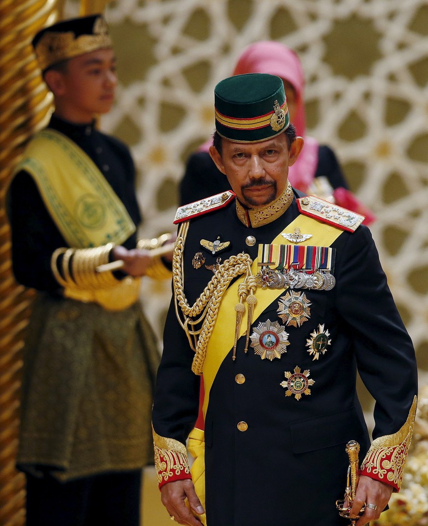 Brunei's Sultan Hassanal Bolkiah attends the wedding of his son Prince Abdul Malik and Dayangku Raabi'atul 'Adawiyyah Pengiran Haji Bolkiah during the "bersanding" or enthrone ...