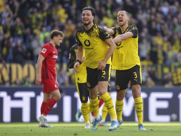 Dortmund a officialisé sa place en Ligue des Champions pour la saison prochaine face à un Fribourg affaibli.