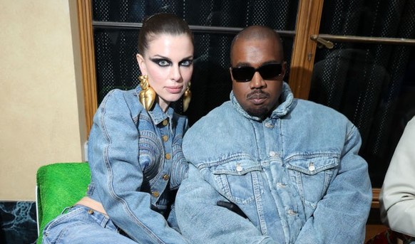 PARIS, FRANCE - JANUARY 23: (L to R) Julia Fox and Ye attend the Kenzo Fall/Winter 2022/2023 show as part of Paris Fashion Week on January 23, 2022 in Paris, France. (Photo by Victor Boyko/Getty Image ...