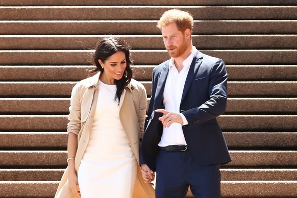 SYDNEY, AUSTRALIA - OCTOBER 16: Prince Harry, Duke of Sussex and Meghan, Duchess of Sussex meet the public at Sydney Opera House on October 16, 2018 in Sydney, Australia. The Duke and Duchess of Susse ...