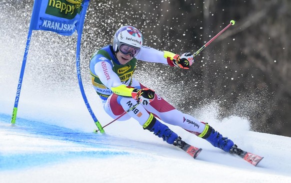 Switzerland&#039;s Marco Odermatt competes during an alpine ski, World Cup men&#039;s giant slalom in Kranjska Gora, Slovenia, Saturday, March 13, 2021. (AP Photo/Marco Tacca)