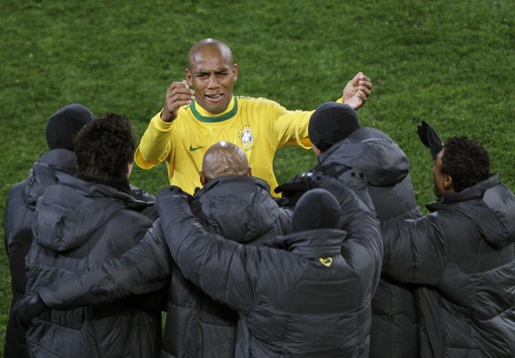 Brazil&#039;s Maicon, center back, celebrates with fellow team members after scoring the opening goal during the World Cup group G soccer match between Brazil and North Korea at Ellis Park Stadium in  ...