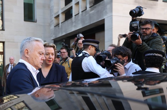 epa11607971 Former BBC news presenter Huw Edwards (L) leaves Westminster Magistrates&#039; Court following his sentencing hearing in London, Britain, 16 September 2024. Huw Edwards was given a suspend ...