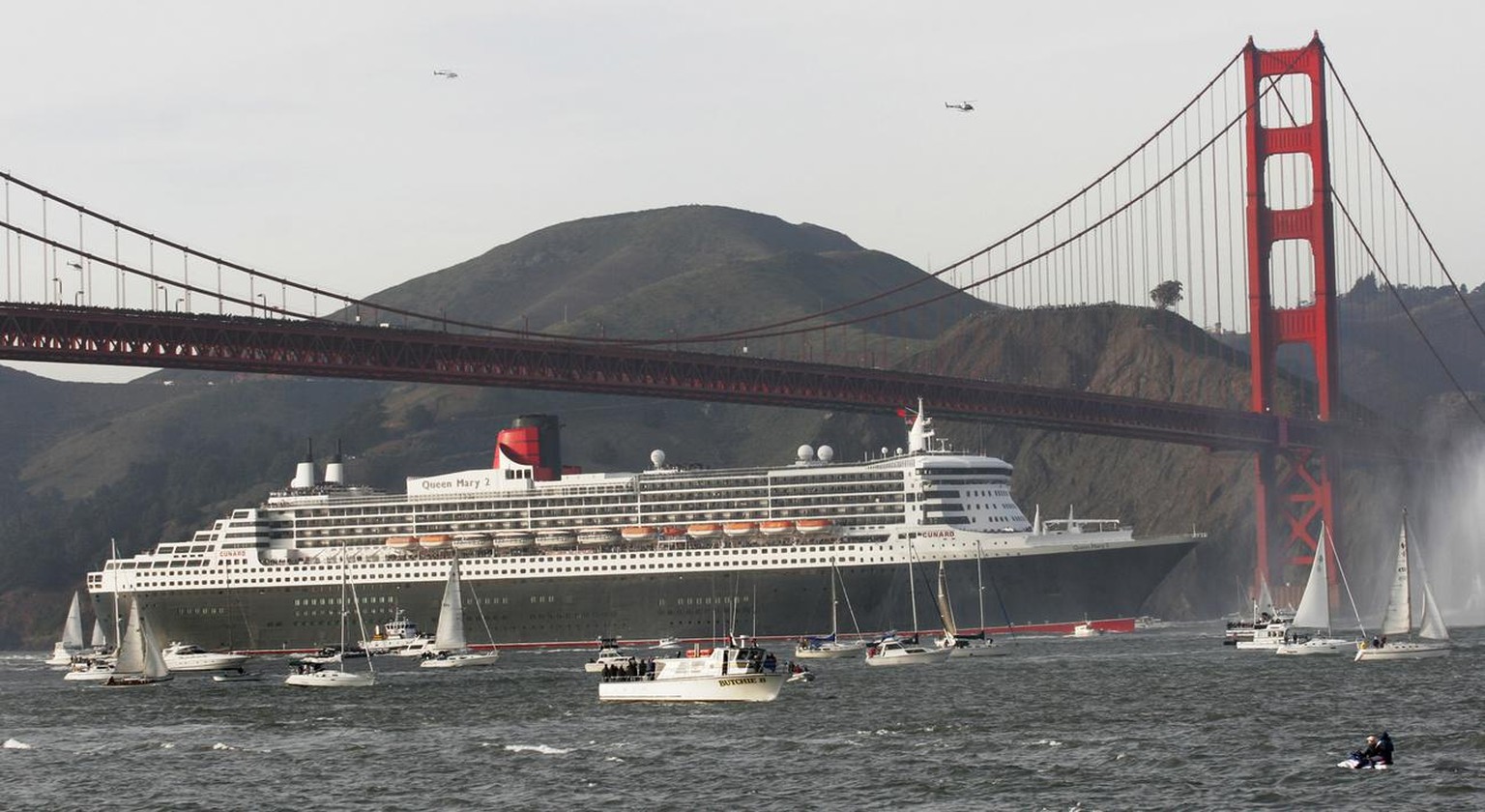 The Queen Mary 2 passes under the Golden Gate Bridge, Sunday, Feb. 4, 2007, near San Francisco. The 151,000 ton, 1,132-foot-foot-long ship is the largest vessel to sail through the Golden Gate and San ...