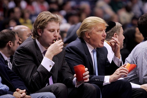 NEW YORK - OCTOBER 31: Eric Trump and Donald Trump attend Chicago Bulls vs New Jersey Nets game at the IZOD Center on October 31, 2007 in East Rutherford, New York. (Photo by James Devaney/WireImage)