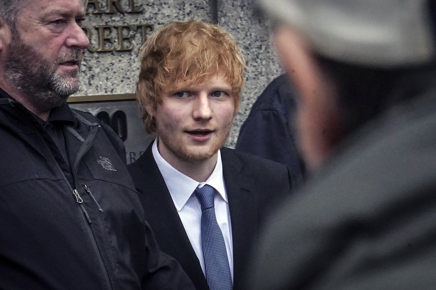 Ed Sheeran leaves federal court, Thursday, April 27, 2023, in New York. In a packed New York courtroom, a cheerful Ed Sheeran picked up his guitar Thursday and launched into a few bars of a tune that  ...