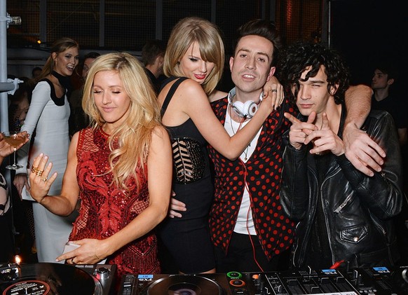 LONDON, ENGLAND - FEBRUARY 25: (L to R) Karlie Kloss, Ellie Goulding, Taylor Swift, Nick Grimshaw and Matt Healy attend the Universal Music Brits party at The Soho House Pop-Up on February 25, 2015 in ...