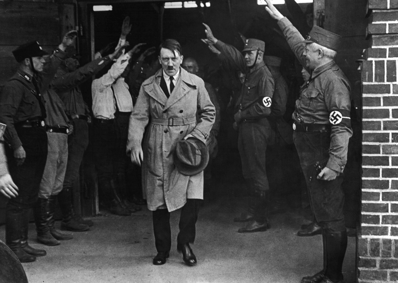 FILE - In this Dec. 5, 2013 file photo Adolf Hitler, leader of the National Socialists, emerges from the party&#039;s Munich headquarters. Historical documents show Adolf Hitler enjoyed special treatm ...