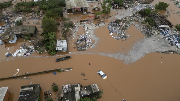 epa11316995 A picture taken with a drone shows the flood caused by the overflow of the Jacui river in the Praia de Paqueta, in the metropolitan area of Porto Alegre, Brazil, 03 May 2024. Regional auth ...