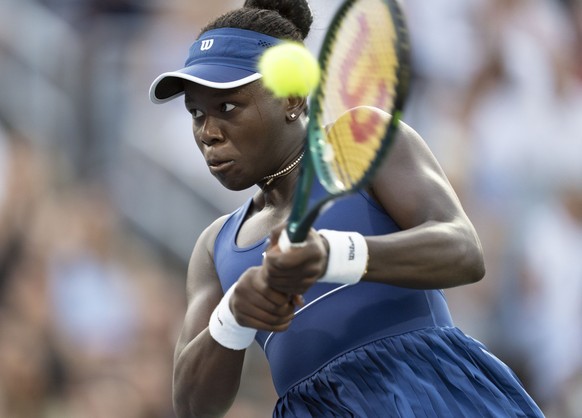 Victoria Mboko of Canada hits a return to Elena Rybakina of Kazakhstan during semifinal tennis action at the National Bank Open in Montreal, Wednesday, Aug. 6, 2025. (Christinne Muschi/The Canadian Pr ...