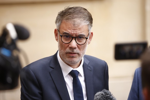 epa12351072 First Secretary of the Socialist Party (PS) Olivier Faure speaks to the media as he leaves the Hotel Matignon after meeting French Prime Minister Francois Bayrou as part of talks with diff ...