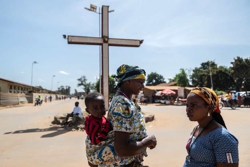 Women head to Sunday Mass at Mudzi-Maria's Cathedral of Our Lady of Grace in Bunia, Congo, Sunday, May 24, 2026. (AP Photo/Moses Sawasawa)
Congo Ebola Church
