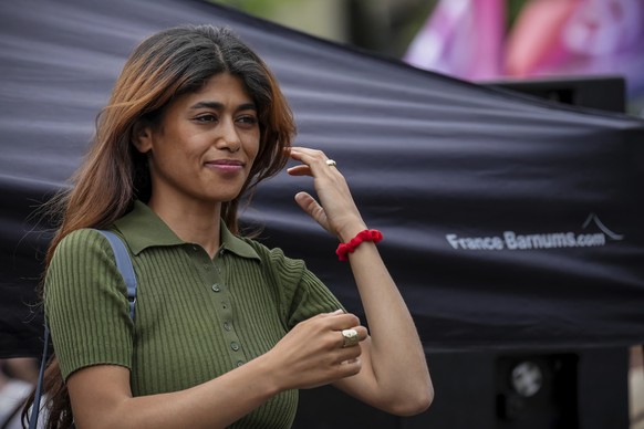 Member of European Parliament Rima Hassan attends a pro-Palestinian demonstration called by several trade unions in Paris, France, Saturday, June 14, 2025. (AP Photo/Aurelien Morissard)
France Israel  ...