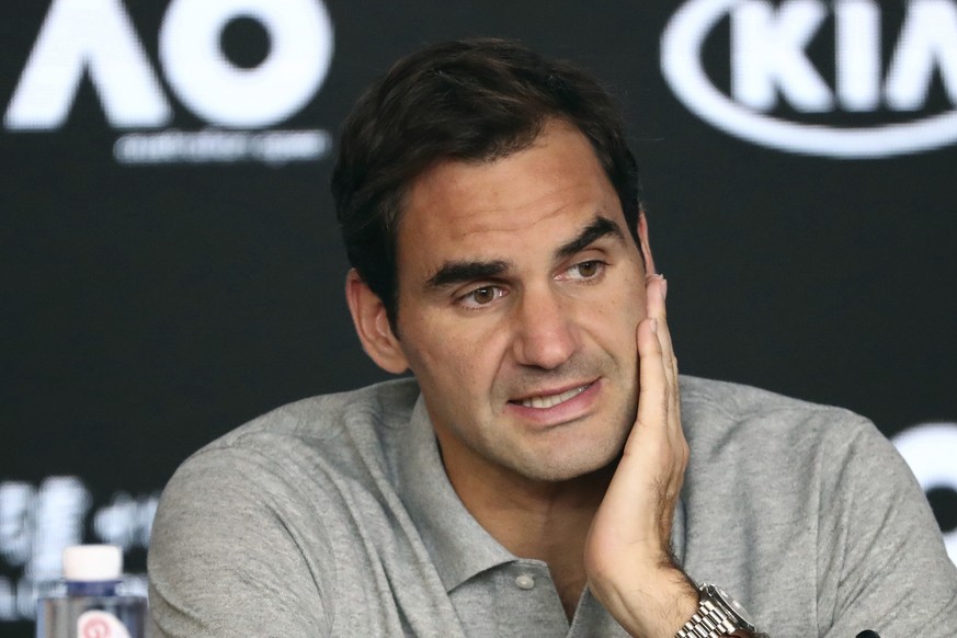 FILE - Switzerland&#039;s Roger Federer speaks during a press conference following his semifinal loss to Serbia&#039;s Novak Djokovic at the Australian Open tennis championship in Melbourne, Australia ...