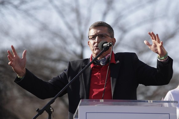 Former National Security Advisor Michael Flynn speaks at the Women for America First March for Trump Rally at Freedom Plaza, Saturday, Dec. 12, 2020, in Washington. (AP Photo/Luis M. Alvarez)