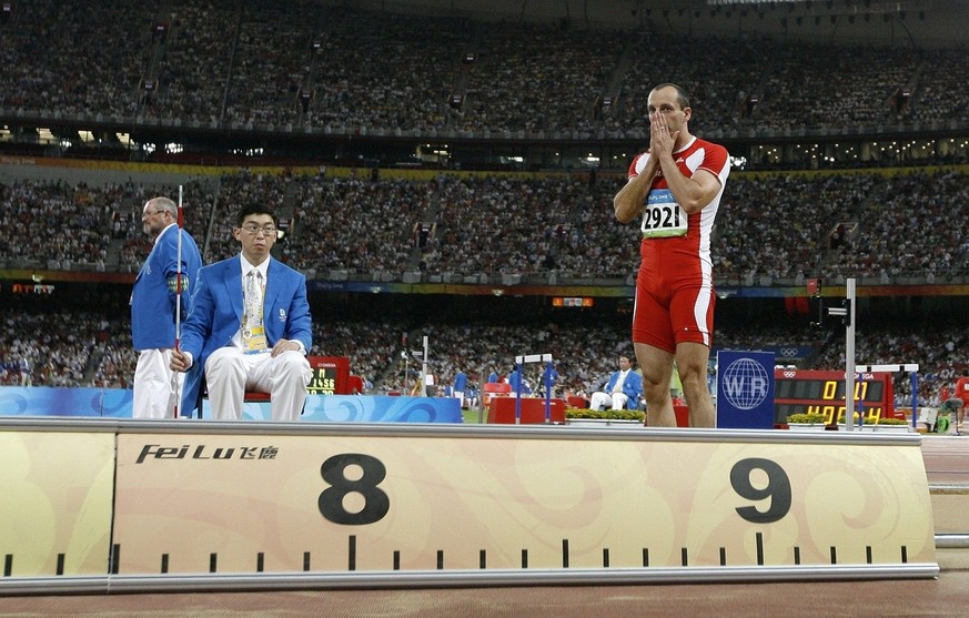 Swiss long jumper Julien Fivaz reacts after his last jump during the athletics competitions in the National Stadium at the Beijing 2008 Olympics in Beijing, Saturday, Aug. 16, 2008. (KEYSTONE/Peter Kl ...