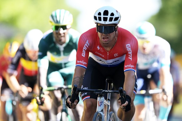 DIJON, FRANCE - JULY 04: Dylan Groenewegen of Netherlands and Team Jayco AlUla crosses the finish line as stage winner during the 111th Tour de France 2024, Stage 6 a 163.5km stage from Macon to Dijon ...