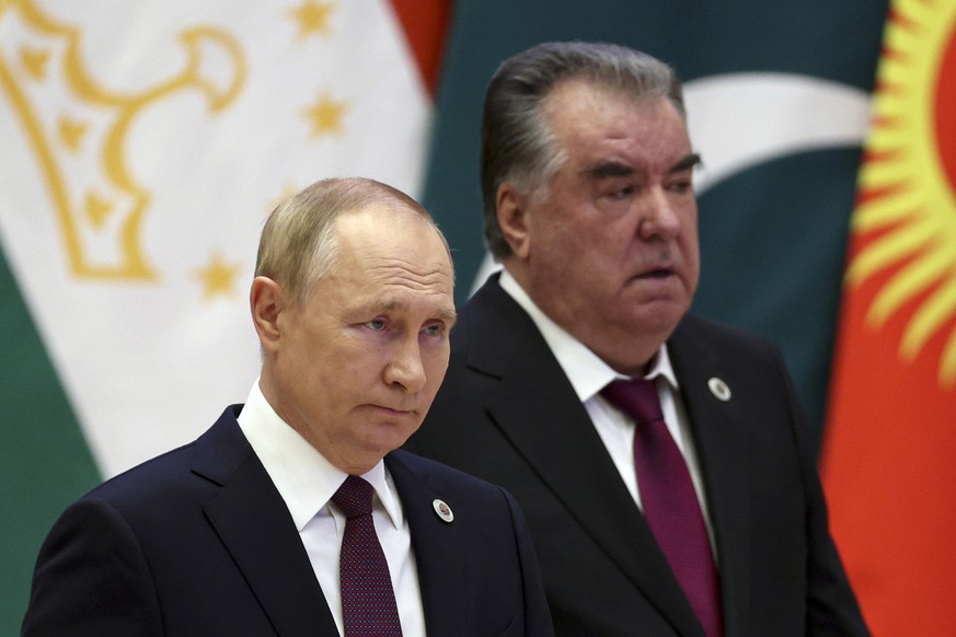 Russian President Vladimir Putin, left, and Tajikistan&#039;s President Emomali Rahmon arrive to attend the Shanghai Cooperation Organization (SCO) summit in Samarkand, Uzbekistan, Friday, Sept. 16, 2 ...