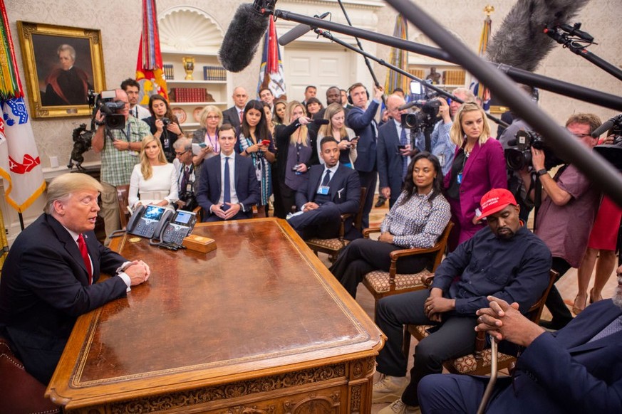 WASHINGTON, DC - OCTOBER 11: President Donald Trump meets with rapper Kanye West in the Oval Office of the White House in Washington D.C. on October 11, 2018. (Photo by Calla Kessler/The Washington Po ...
